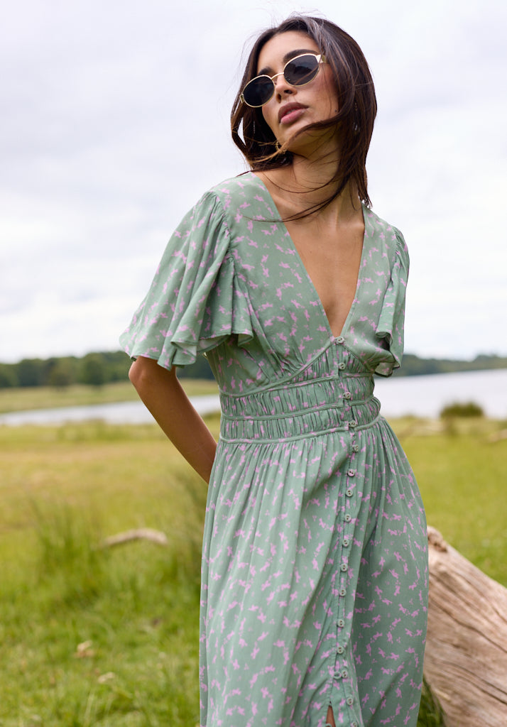 Light green V Neck Printed Midi dress with gathered waist and fluted sleeve